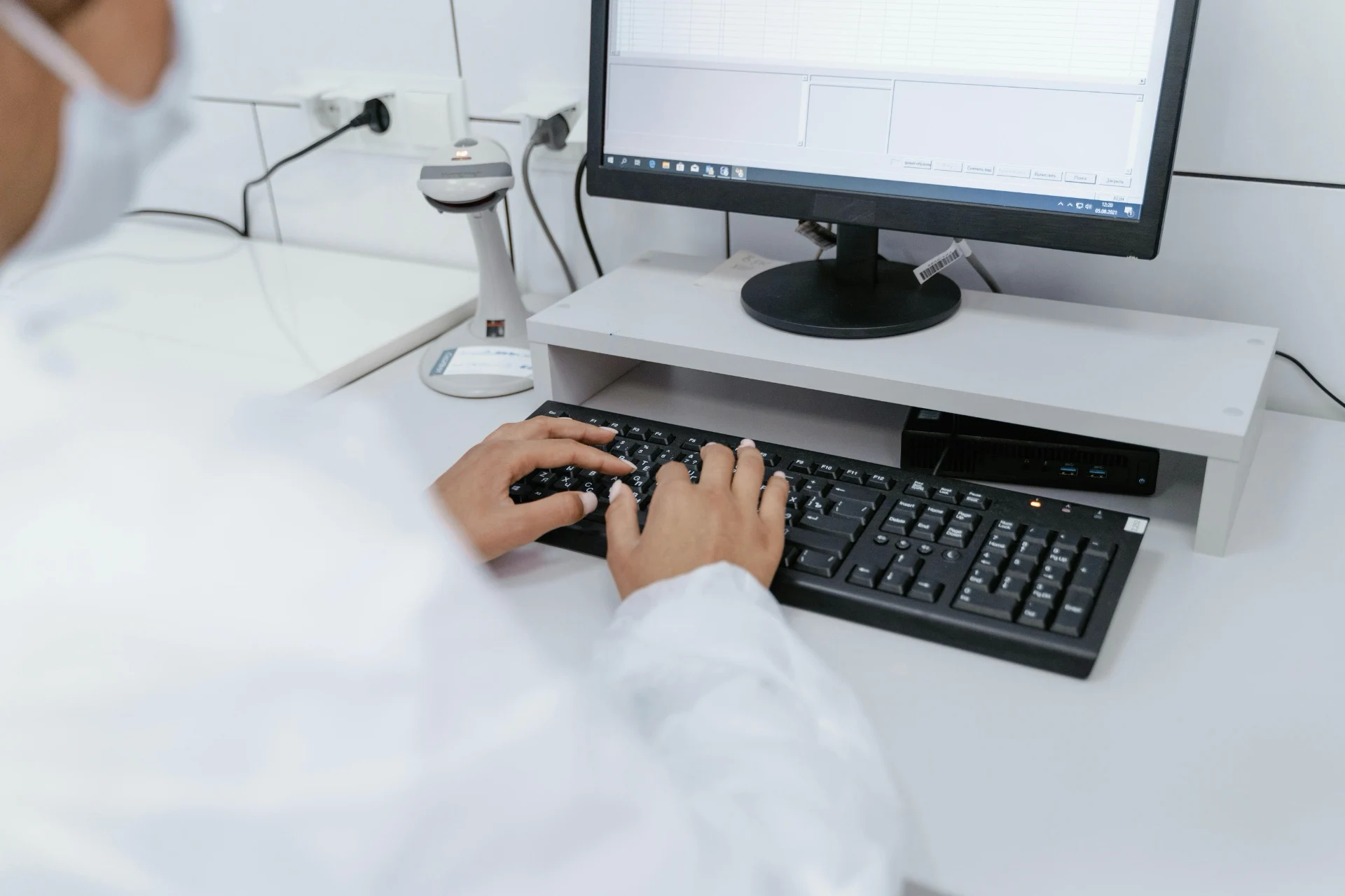 Doctor entering sensitive information