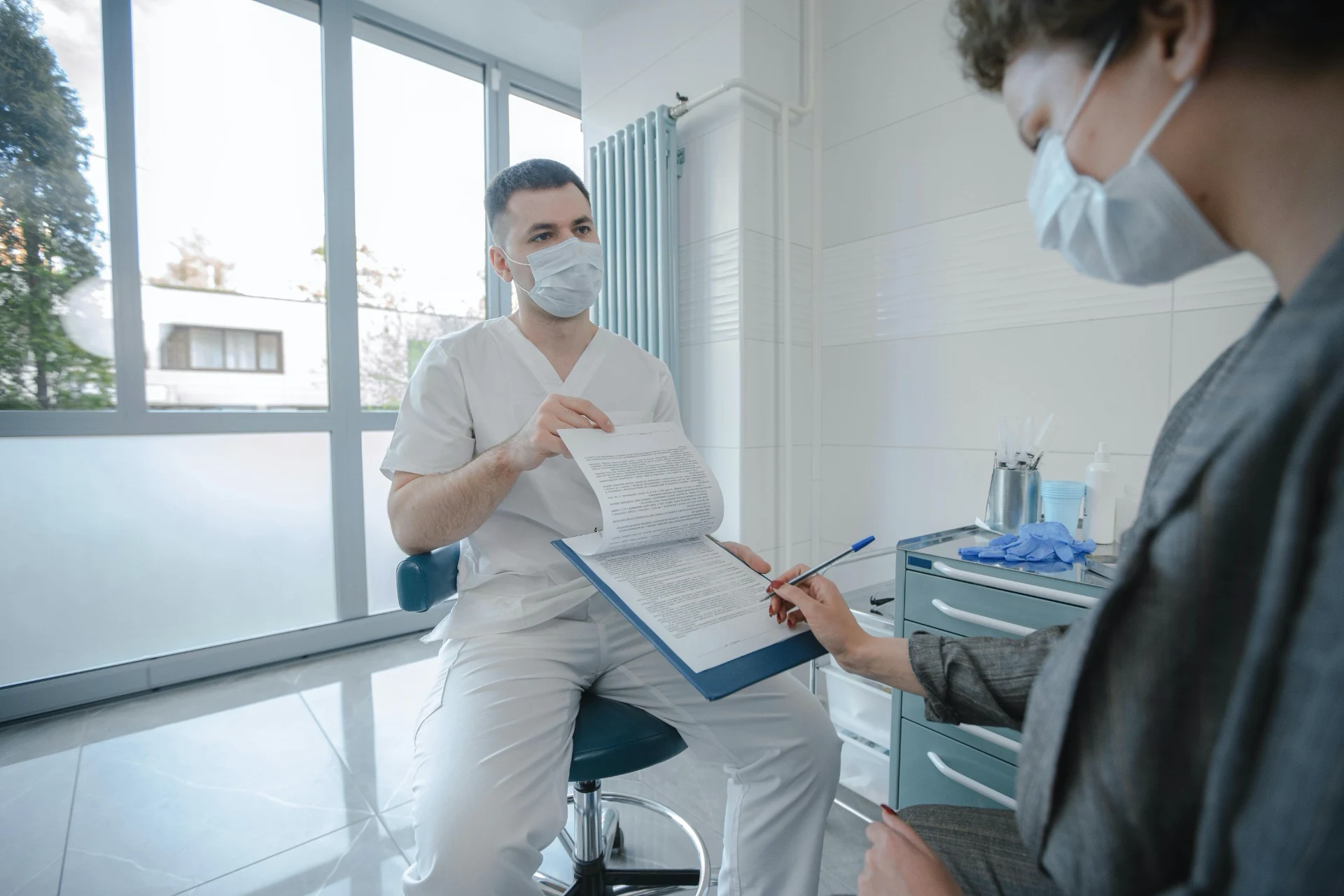 Patient signing the HIPAA form